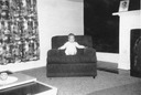 David as infant in chair