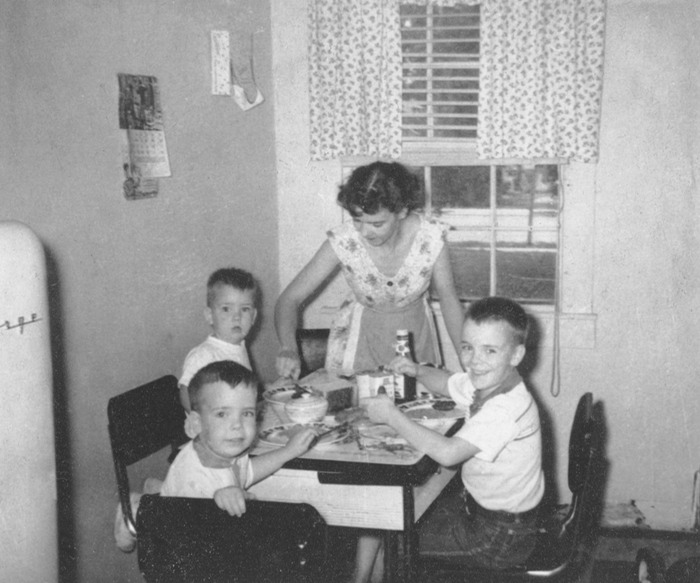 David, Mark, Mom and Alan at the table