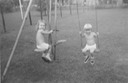 duo on a swing set